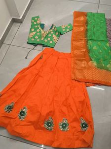 Vibrant Orange & parrot Embroidered Lehenga Choli