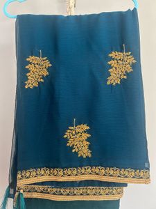 Elegant Teal Saree with Gold Embroidery