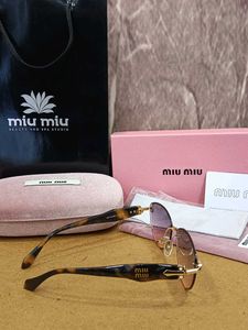 Miu-Miu Sunglasses - Pink Oval Fram