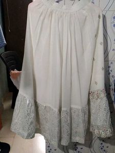 Farashi sharara and peplum top fully embroidered.