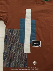 oversized Brown T-shirt with graphic patchwork art