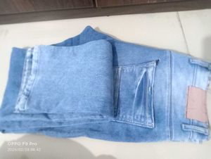 Stylish Light Wash Denim Jeans with Unique Patch D