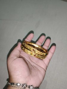 Elegant Gold Tone Bangles with Stones