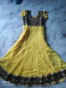 yellow net suit.