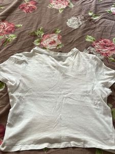 Chic White Graphic Tee with Bow Detail