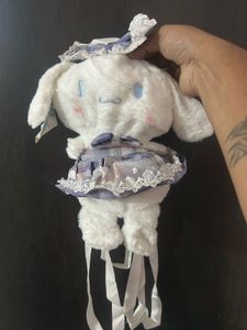 Cinnamoroll backpack wearing a striped dress