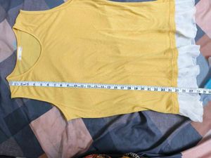 Yellow Sleeveless Top with Ruffle Hem