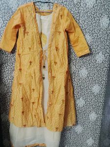 Elegant Off white colour Kurti with Shrug