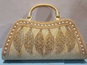 Elegant Gold Embellished Clutch