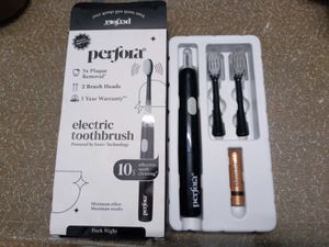 Perfora Electric Toothbrush Set brand new