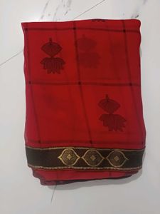 Elegant Red Saree with Lotus Motifs