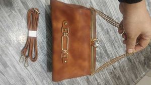 Elegant Brown Clutch with Chain Detail