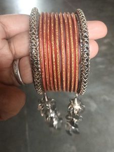 Sparkling Orange Bangles with Silver Accents