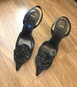 Elegant Black Heels with Embellished flower patch