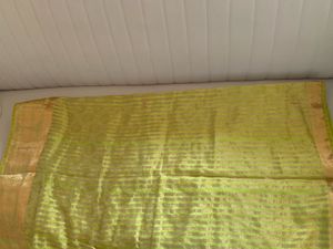Vibrant Green Silk Saree with Gold Border