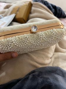 white pearl clutch