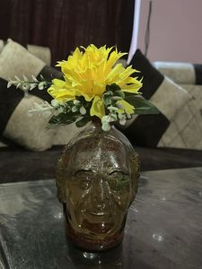 Unique Head-Shaped Vase with Yellow Flower