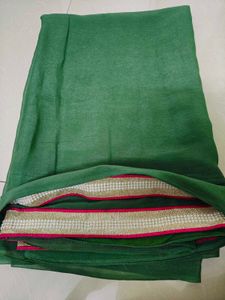 Elegant Green partywear Saree with Pink Border