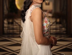 Stunning White Lehenga with Floral Blouse