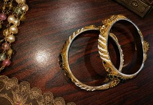 Elegant Gold Bangles with Pearl Accents
