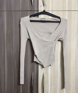 GLOW AND NYMPH Ribbed Wrap Long Sleeve Top