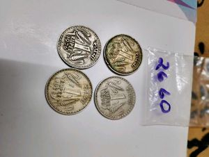 4 big 1 rupee coin