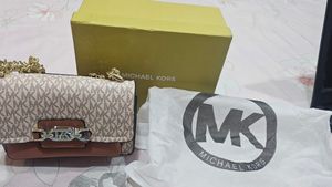 -Free Delivery -MK Sling Bag