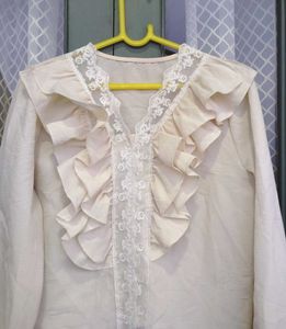 Victorian style ruffled blouse