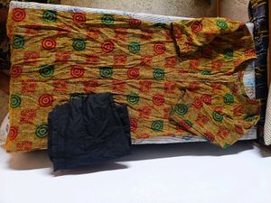 Yellow Printed Kurta with Black Pants
