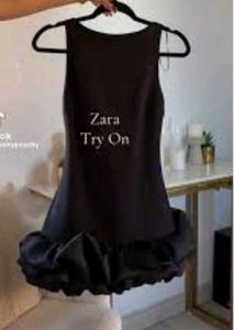 Chic Black Mini Dress with Ruffle Hem
