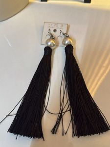 Elegant Black Tassel Earrings with Pearl Accent
