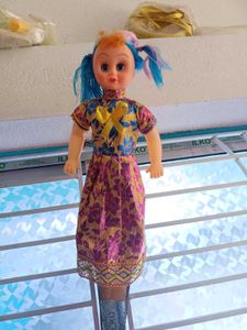 Vintage Doll with Colorful Outfit