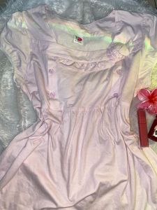 A cute pink baby doll top