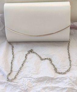 Code by Lifestyle White Shimmer Clutch
