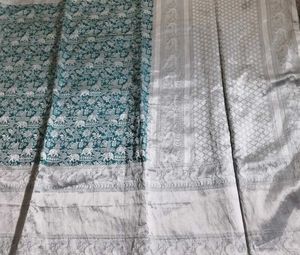 Beautiful Teal Saree with Silver Weave