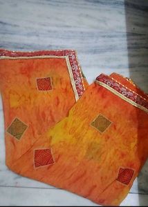 Vibrant Orange Saree with Geometric Print