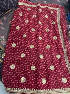 Elegant Maroon Saree with Gold Embroidery