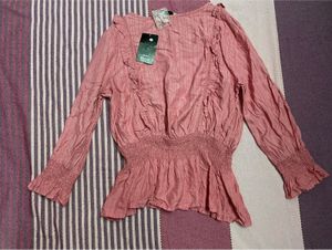 Pink Smocked Peplum Blouse