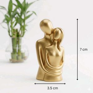 Golden Couple Hugging Sculpture