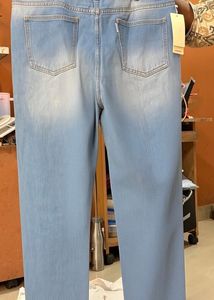 Distressed Light Wash Denim Jeans