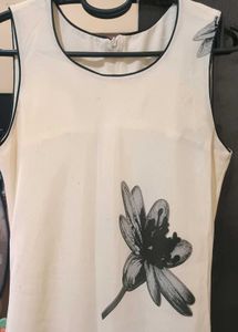 white floral stylish sleveless frock