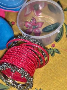 Vibrant Red Bangles with Silver Charms