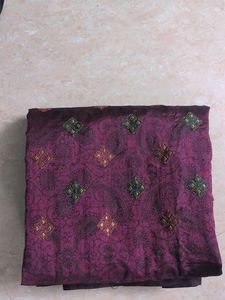 Elegant Purple Saree with Intricate Patterns