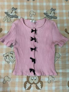 Cute Pink Ribbed Top with Bows