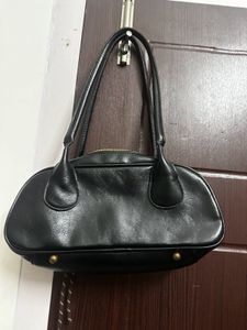 Chic Black Handbag with Charms