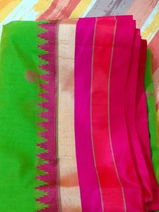 Parrot Green Saree with Pink Border