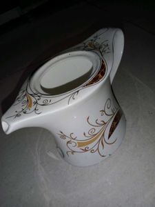 Vintage Gravy Boat with Ornate Design