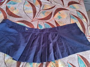Plated Wrapped Mini Skirt.