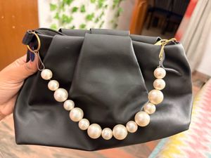 Chic Black Clutch with Pearl Handle