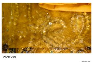 Stunning Yellow Embroidered Kundan Saree